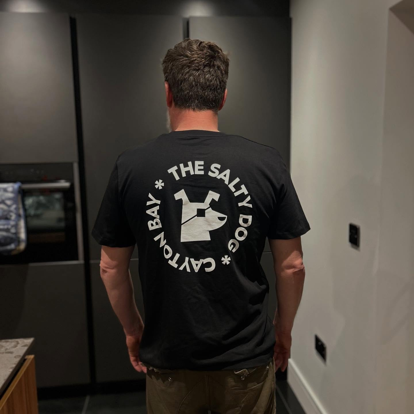Black Salty Dog logo tee modelled from the back